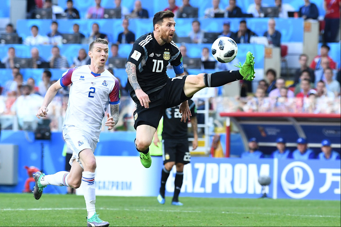 Soccer_World Cup_Argentina forward Lionel Messi and Iceland defender Birkir Mar Svarsson